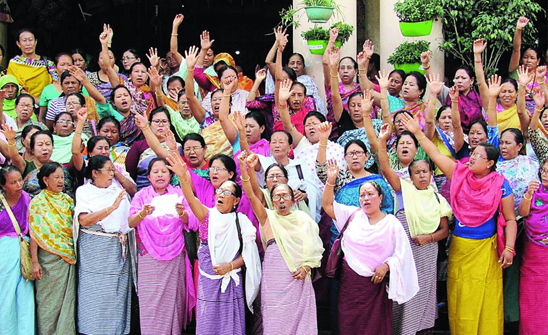 An image showcasing a large group of women protesting for their rights- highlighting gender upclose for UPES